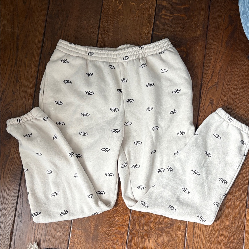 Cream Joggers with Eye Pattern